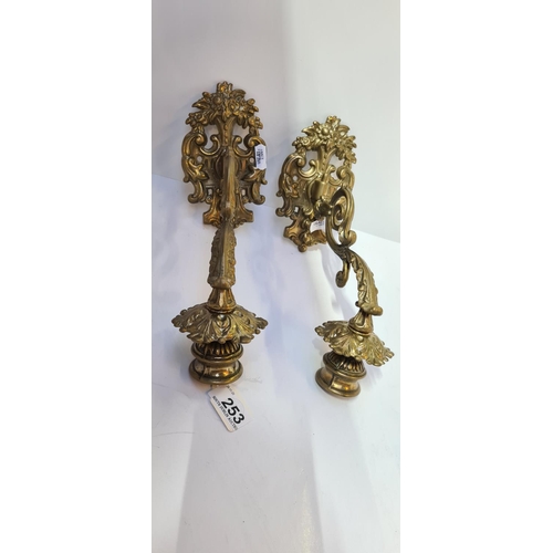 253 - Good pair of heavy brass piano candle sconces.