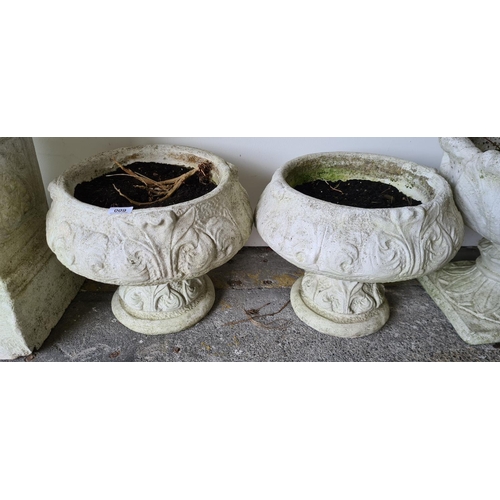 9 - Pair of good size heavy round planters.