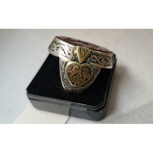 23 - Super large Antique ring Probably silver. lots of detail to the amount with taglio figure. Very old ... 