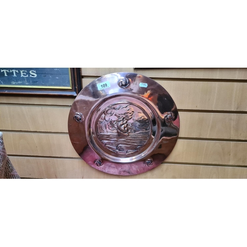 109 - Large Copper charger Depicting a sailing ship.