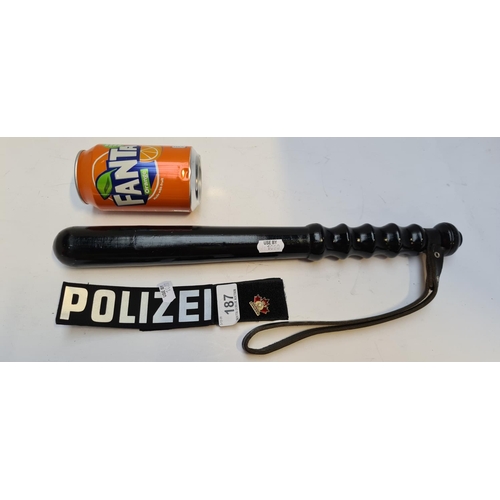 187 - Vintage RUC police batton, also a Polizei Velcro patch and a Royal Mounties maple badge.