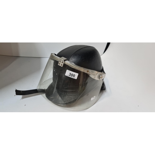 300 - Vintage Riot helmet. London maker with a leather neck protector.