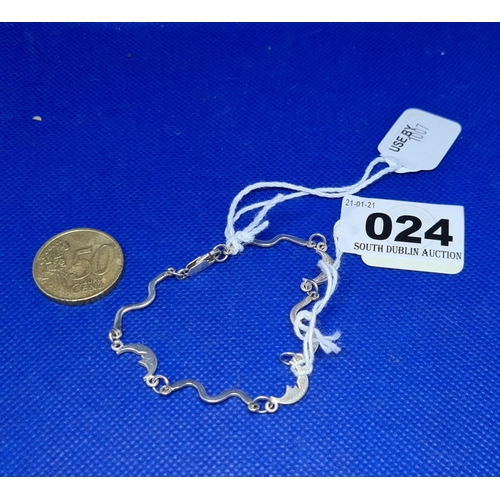 24 - Sterling silver bracelet with moon design.