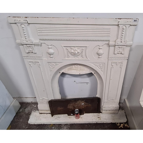 561 - Cast metal antique fire place.