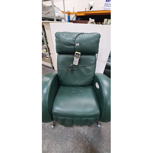 532 - Green plug in reclining calf leather armchair. With recline and massage function. In very good condi... 