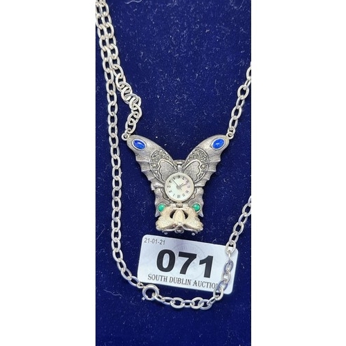 71 - Sterling silver Butterfly pendent with a hidden fob watch on a long chain.