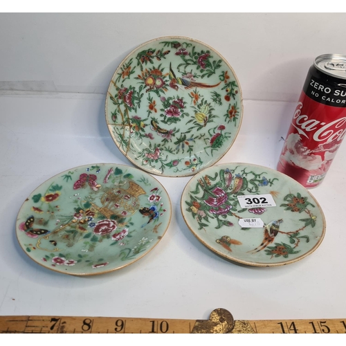 302 - Three Antique chinese plates. One with a repair.