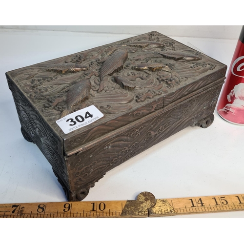 304 - Antique bronze Chinese box with fish in relief.