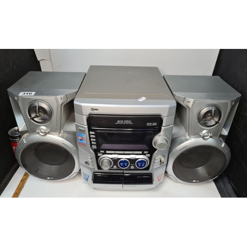 310 - LG Stereo with 3 CDS. XDSS