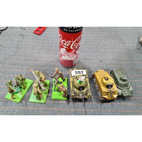 557 - Collection of vintage military vehicles and 3 sets of ground artillery lead soldiers.