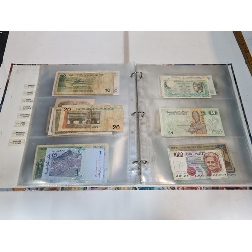 150 - Album of bank notes and coins.