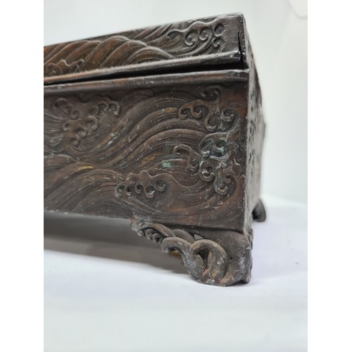 304 - Antique bronze Chinese box with fish in relief.