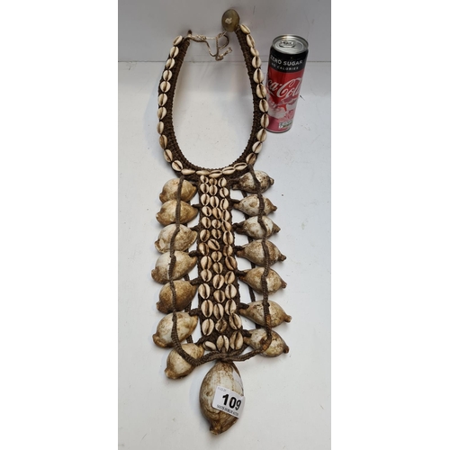 109 - Huge tribal shell necklace over two feet long.