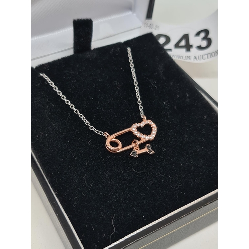 243 - 9ct gold on silver lovers heart pendant