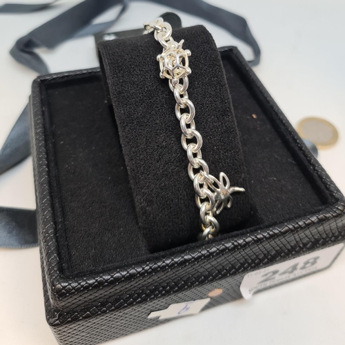 248 - Silver charm bracelet