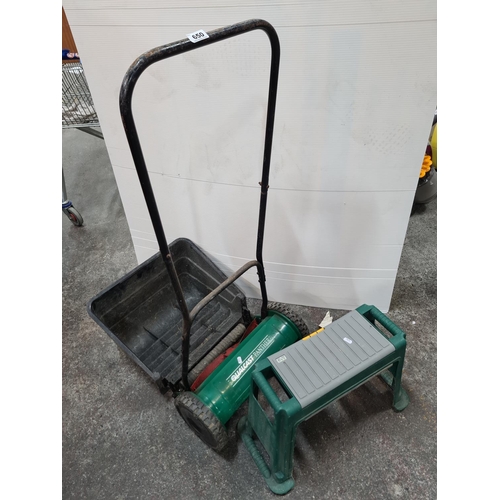 650 - Qualcast panther hand powered cylinder lawnmower and a gardeners stool.
