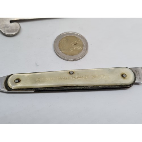 303 - Two interesting letter openers the Skinny one. folds out for a penknife as well London made and the ... 