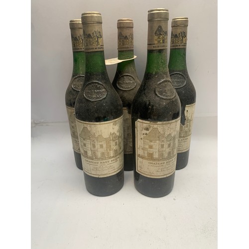 52 - Chateau Haut Brion 1974, Pessac-Leognan. One of the oldest vineyards in Bordeaux 5 x Bottles 
Good u... 