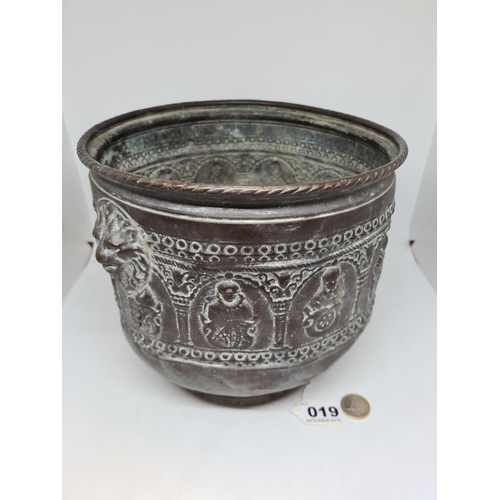 19 - Good 19th century copper pot with lion mask handles in relief and lots of detail.