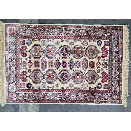 342 - Very soft cashmir rug. With ivory and red colours. 186cm x 117cm