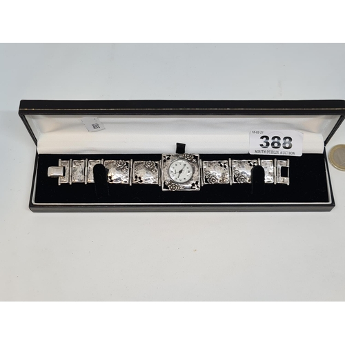 388 - Sterling silver strap and case ladies quartz. Nice Art Nouveau piece.