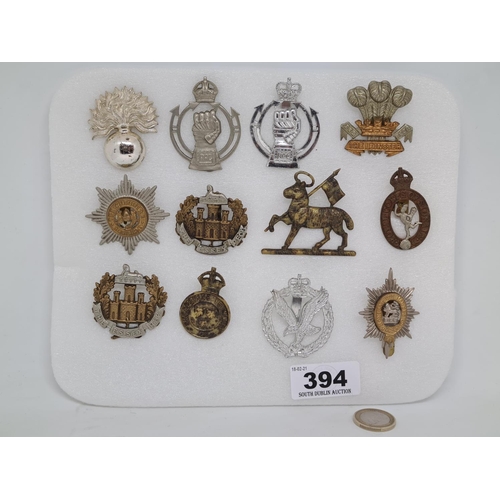 394 - Set of 12 Antique world war 1 and 2 cap badges.