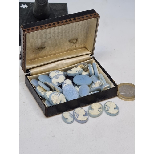 415 - Victorian box full of blue Victorian shell cameos.