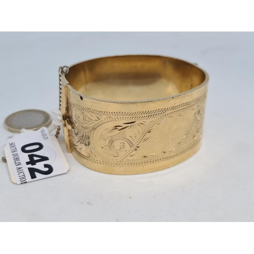 42 - 22ct Rolled gold thick heavy 1950s cuff bracelet with engine turned decoration.