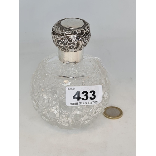 433 - Victorian cut crystal large perfume bottle with sterling silver top.