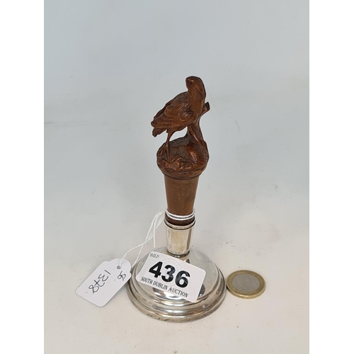 436 - Carved wooden bird on a sterling silver base. Weighted and heavy. Birmingham hallmarks.