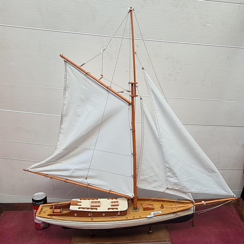 490 - Nice large model sailing boat with cloth sails.