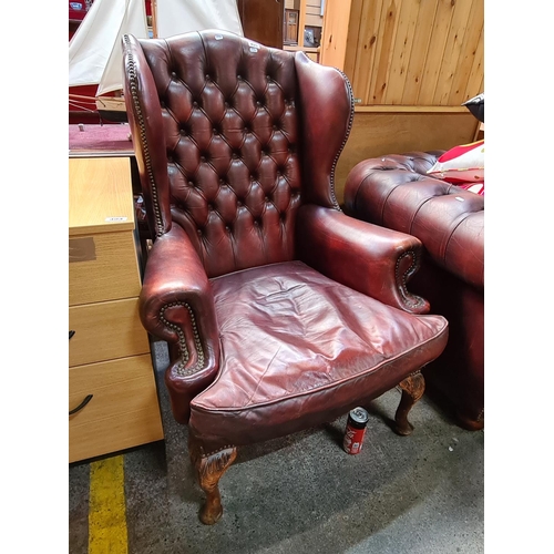 495 - Vintage Ox Blood Chesterfield windback library chair.