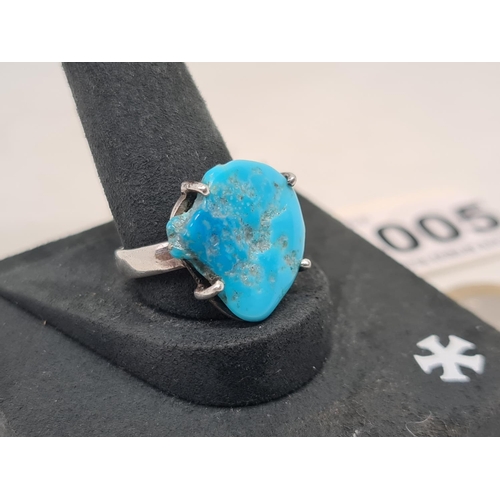 5 - Sterling silver ring with turquoise stone. With makers mark.