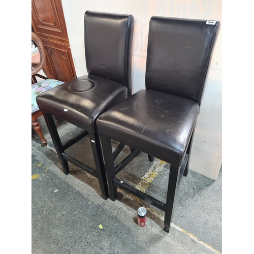 544 - Tall black leather stools