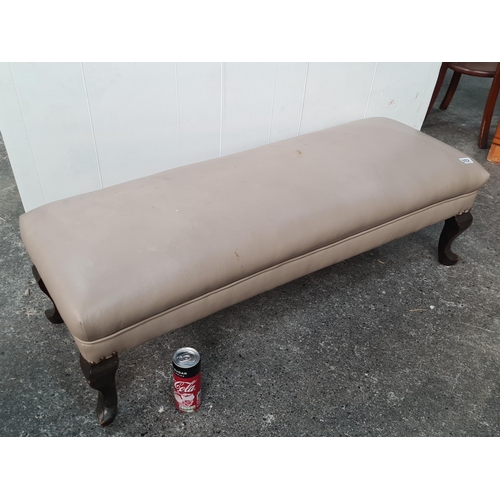 552 - long leather ottoman