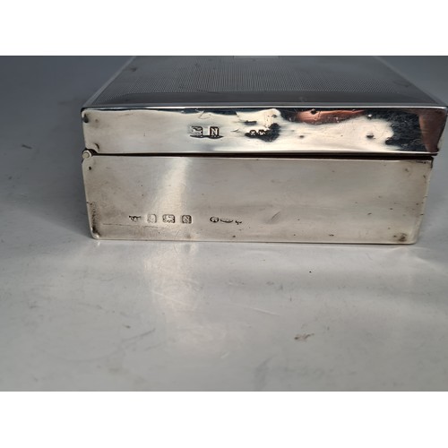 22 - Sterling silver cigarette box dated 1938.