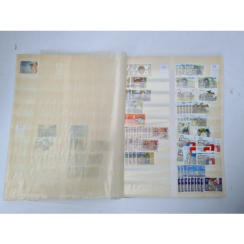 364 - Very Good quality blue Stamp Album with mint and high value stamps. Mostly Irish.