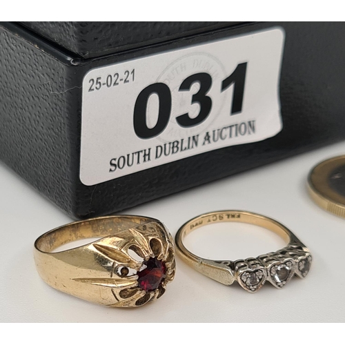 31 - Two rings, the larger with a red stone is 9ct gold on silver and the other with 3 hearts is 9ct Gold... 