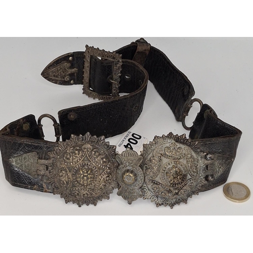 4 - A 19th century or earlier leather belt with highly worked mounts super decorative and top quality. I... 