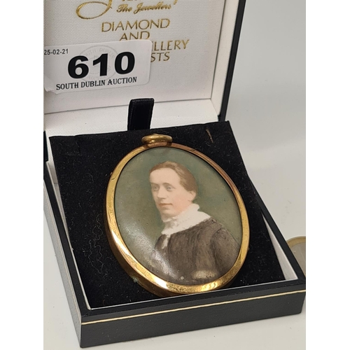 610 - Antique Miniature oil painting of a Gentleman in an oval brass frame.