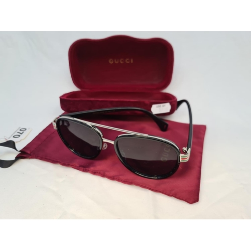 70 - Pair of Gucci aviator sunglasses with signature red and green side panelling. Brand new condition wi... 