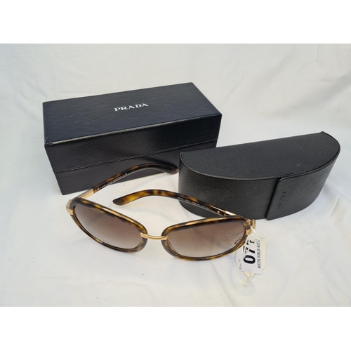 71 - Pair of women's Prada sunglasses with tortoiseshell frame. Brand new condition and in original sungl... 