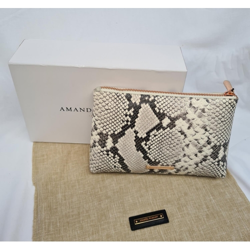 73 - Amanda Wakeley clutch purse in black-and white snakeskin-style leather with rose-gold fixtures. In b... 