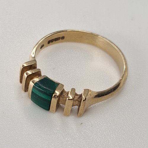 30 - Unusual 9ct gold ring with a green malachite stone. almost 3g.