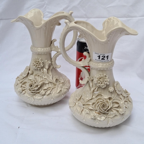 121 - Irish Belleek jugs x 2, a matching pair of 19th Century white rose jugs