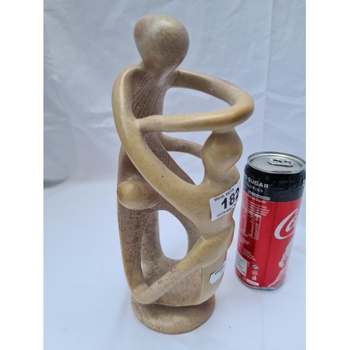 182 - Stone sculpture in the form of a family entwined