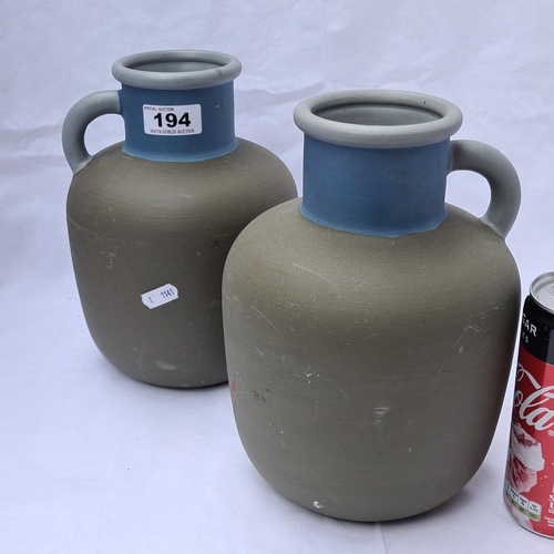 194 - Matching pair of Ikea unglazed jugs