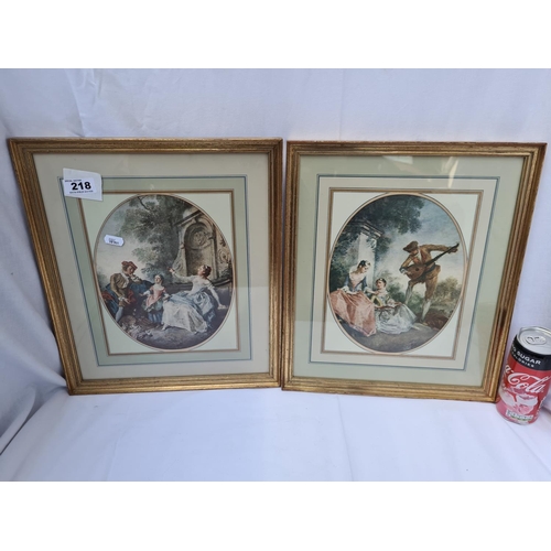 218 - Pair of well framed prints of 18th century paintings. Both show figures at leisure in idyllic settin... 