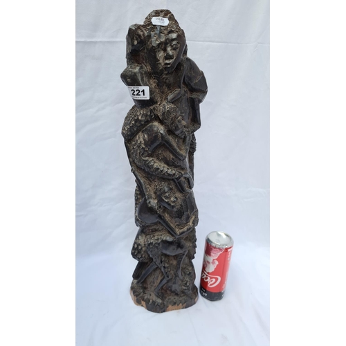 221 - Tall hand carved African wooden figure/totem pole, carved from one piece of wood. The wood is possib... 