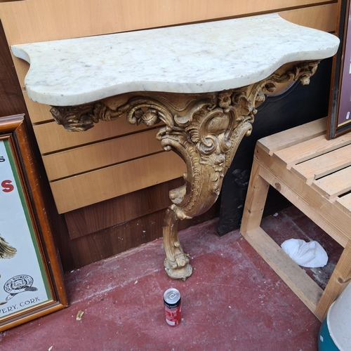 233 - Georgian Single legged, marble topped, gilded table stand. Some small loses but overall a hugely imp... 